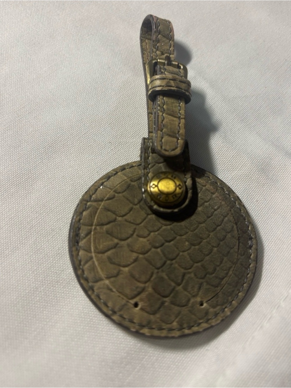 MCM Brown Textured Leather Round luggage tag with Gold Hardware
